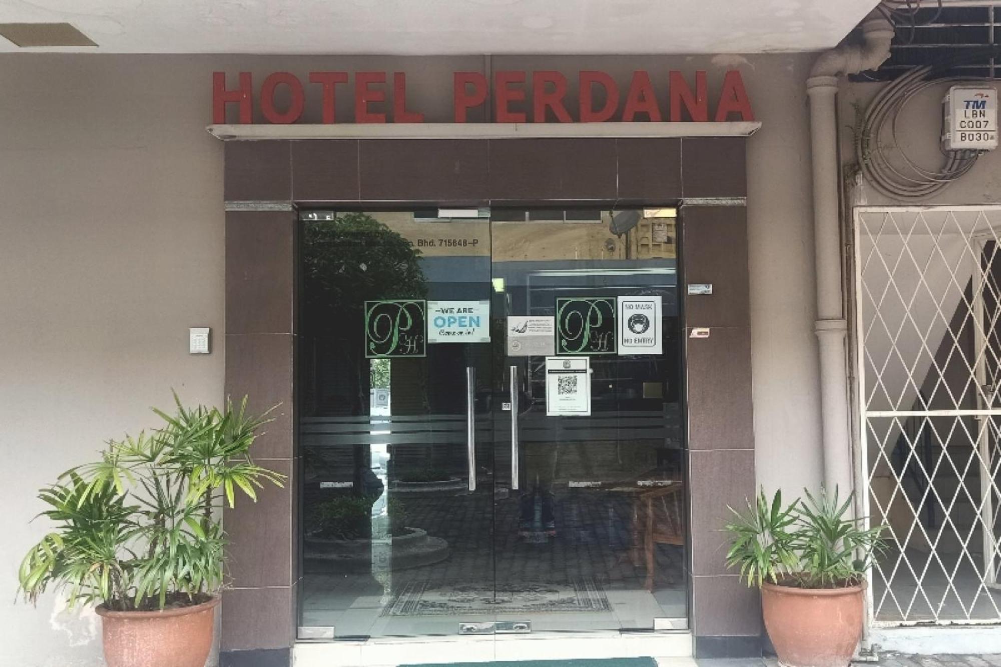 Oyo 90411 Perdana Hotel Labuan Kültér fotó